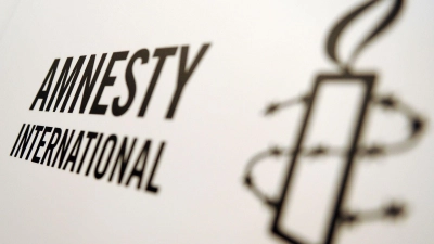 Das Logo von Amnesty International. (Foto: Britta Pedersen/dpa-Zentralbild/dpa)