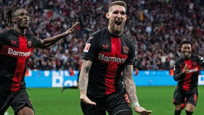 Leverkusen bleibt dank des Last-Minute-Treffers von Robert Andrich auch im 46. Pflichtspiel der Saison ohne Niederlage. (Foto: Marius Becker/dpa)