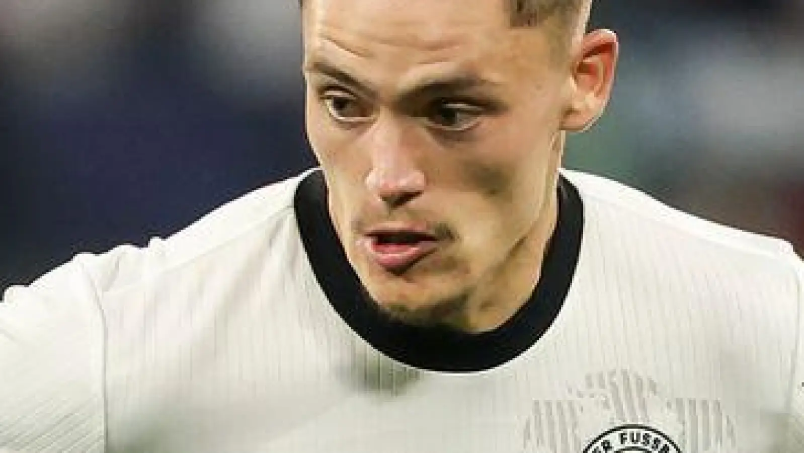 Ein Gespräch mit Red-Coach Arne Slot überzeugte Florian Wirtz vom Wechsel nach Leverkusen (Foto: Christian Charisius/dpa)