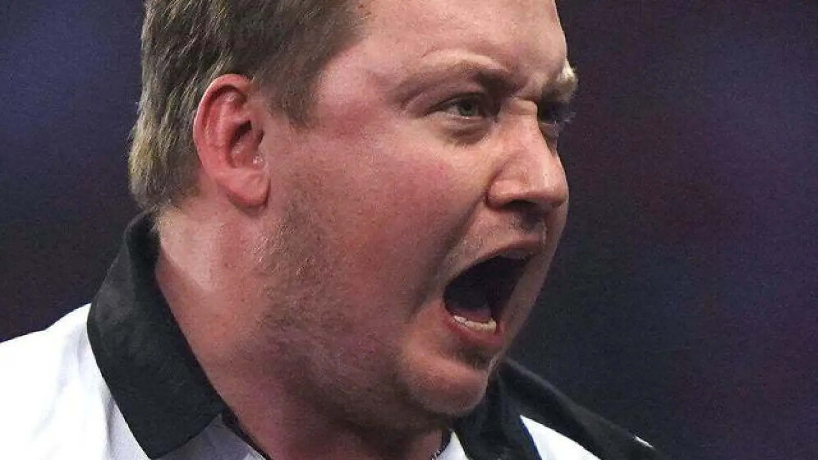 Martin Schindler trifft nun auf Ryan Searle. (Archivbild) (Foto: Bradley Collyer/PA/AP/dpa)