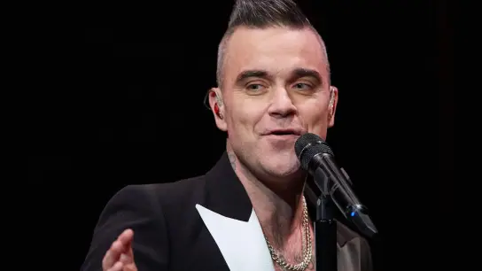 Robbie Williams bleibt seinen deutschen Fans treu. (Foto: Georg Wendt/dpa)