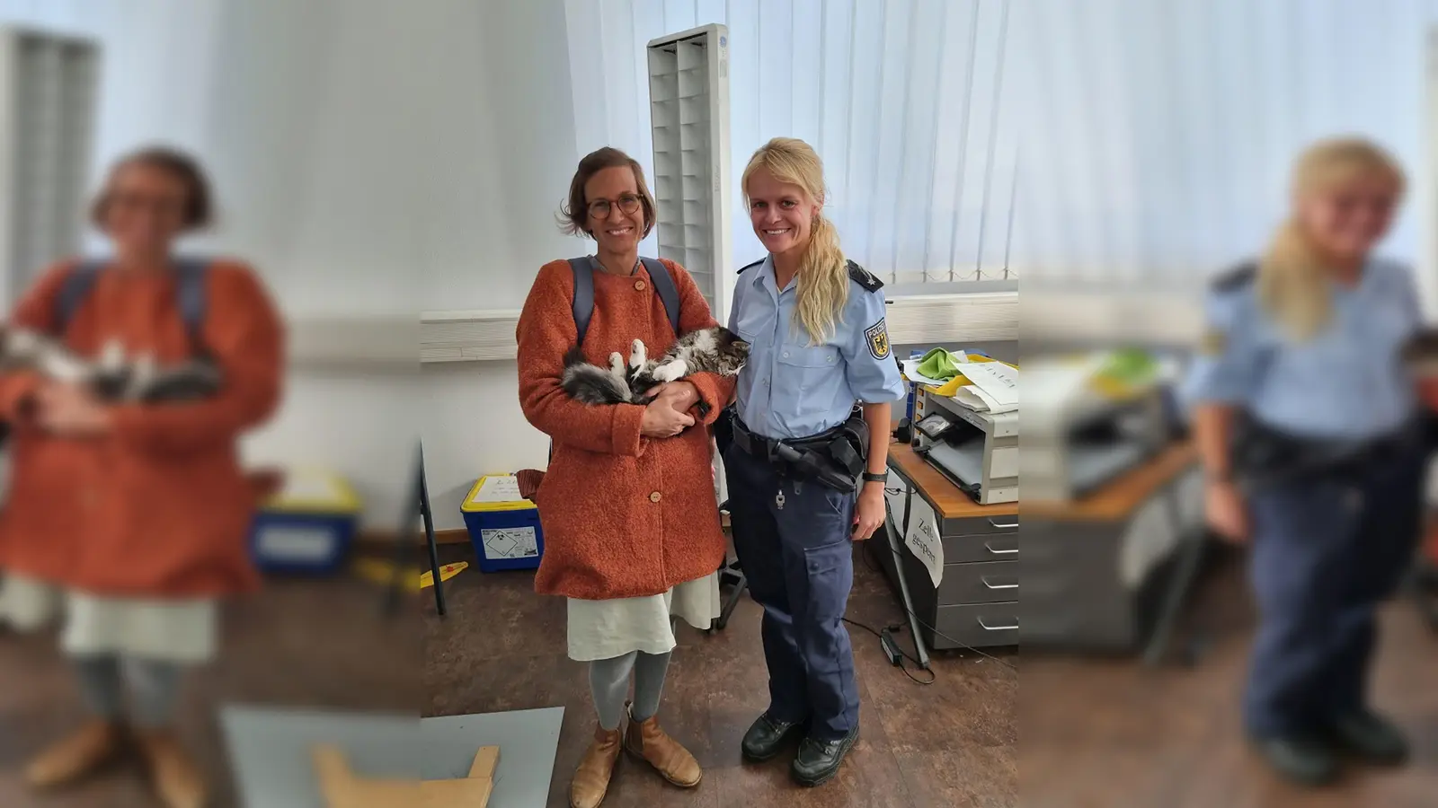 Katzenbesitzerin Alina Huber (l) mit Polizeikommissarin Elisabeth Sitka (r) und Katze „Rosie“. (Foto: Bundespolizei/dpa)