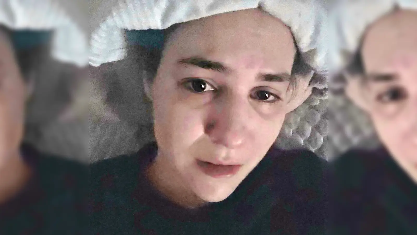 Sarah Buckel auf einem Selbstporträt, das für die Veröffentlichung aufgehellt wurde. Die junge Frau kann ihr Bett im dunklen Zimmer nicht verlassen. (Foto: privat)