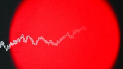 Das deutsche Börsenbarometer bleibt auf Rekordkurs. (Foto: Arne Dedert/dpa)