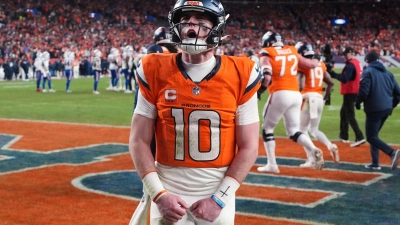 Bo Nix hat die Broncos zum ersten Playoff-Erfolg seit dem Super-Bowl-Sieg vor zehn Jahren geführt. (Foto: David Zalubowski/AP/dpa)