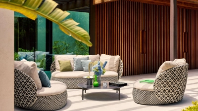 Elegantes Cremeweiß und Ivory: Helle Polsterfarben setzen 2026 moderne Akzente im Garten. (Foto: Dedon/die möbelindustrie/dpa-tmn)