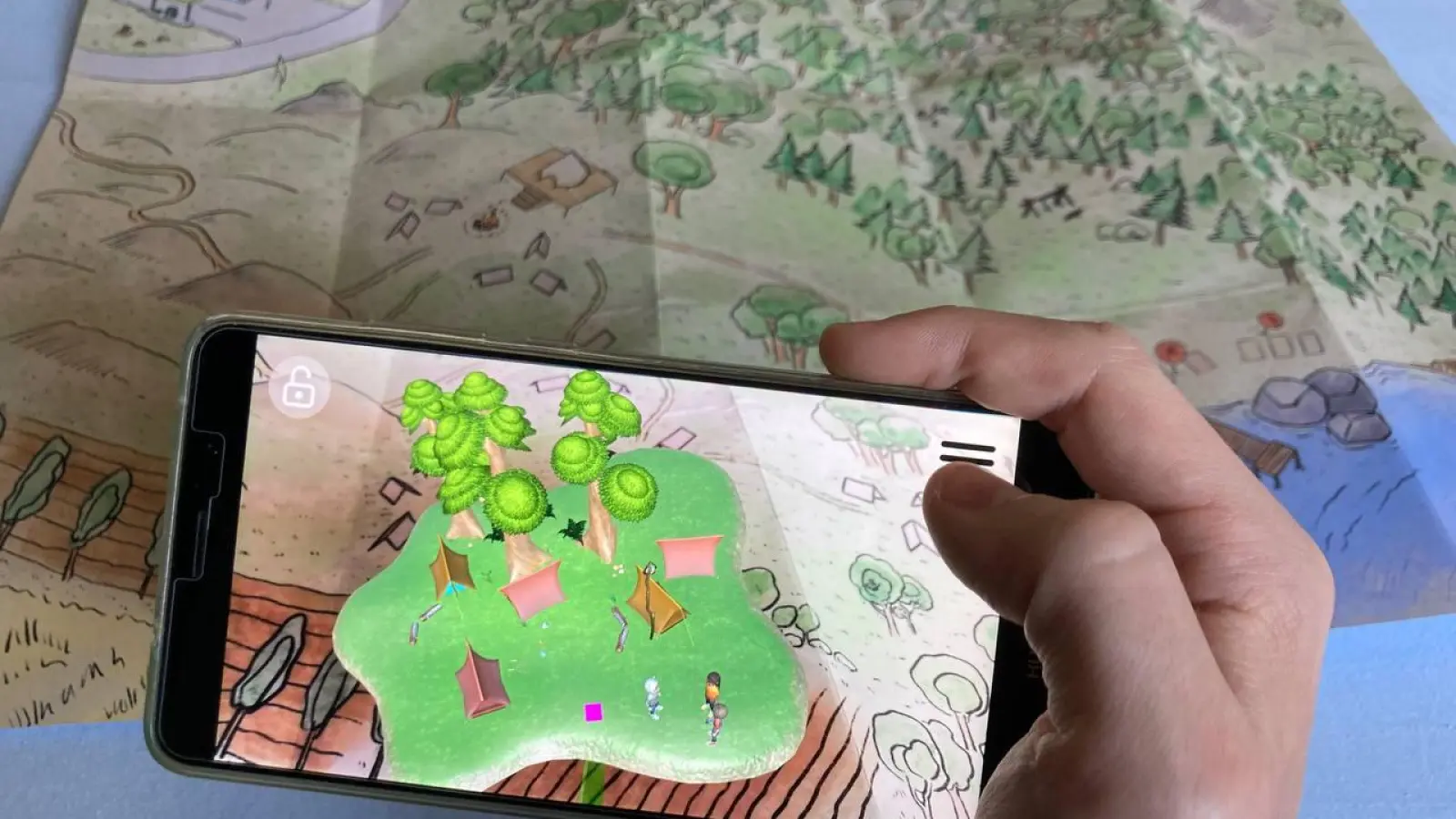 Werden die verschiedenen Orte durch die Kamera eines Smartphones betrachtet, erscheinen an ihrer Stelle die Schauplätze als 3D-Landschaften. (Foto: Laura Mirjam Walter/Kinderclub Rakete Jetzt!)