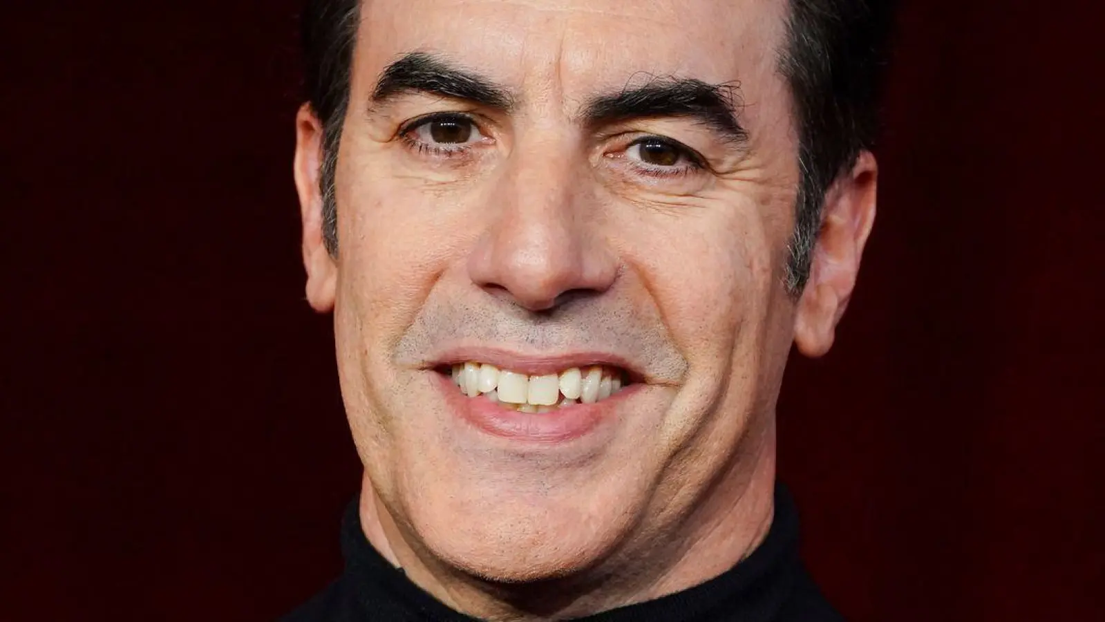 Sacha Baron Cohen schlüpft wieder in seine Rolle als „Ali G“. (Archivbild) (Foto: Jordan Strauss/Invision/AP/dpa)