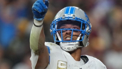 Amon-Ra St. Brown bejubelte seinen Touchdown mit einem Gruß an US-Präsident Donald Trump, der sich das Spiel vor Ort anschaute. (Foto: Stephanie Scarbrough/AP/dpa)