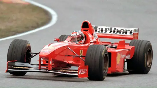 Michael Schumacher im Ferrari F300. (Foto: Marco Bucco/epa/ANSA/dpa)