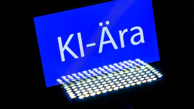 Ohne KI sind die Job-Aussichten für junge Ingenieure mau.  (Foto: Robert Michael/dpa)