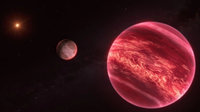 Künstlerische Darstellung des Systems um den Stern CD-35 2722. Das System besteht aus einem Stern, einem Braunen Zwerg und einem Satelliten. (Foto: M. Kornmesser/ESO/dpa)