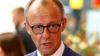 Das Abschlussstatement gab Merz alleine ab.  (Foto: Moritz Frankenberg/dpa)