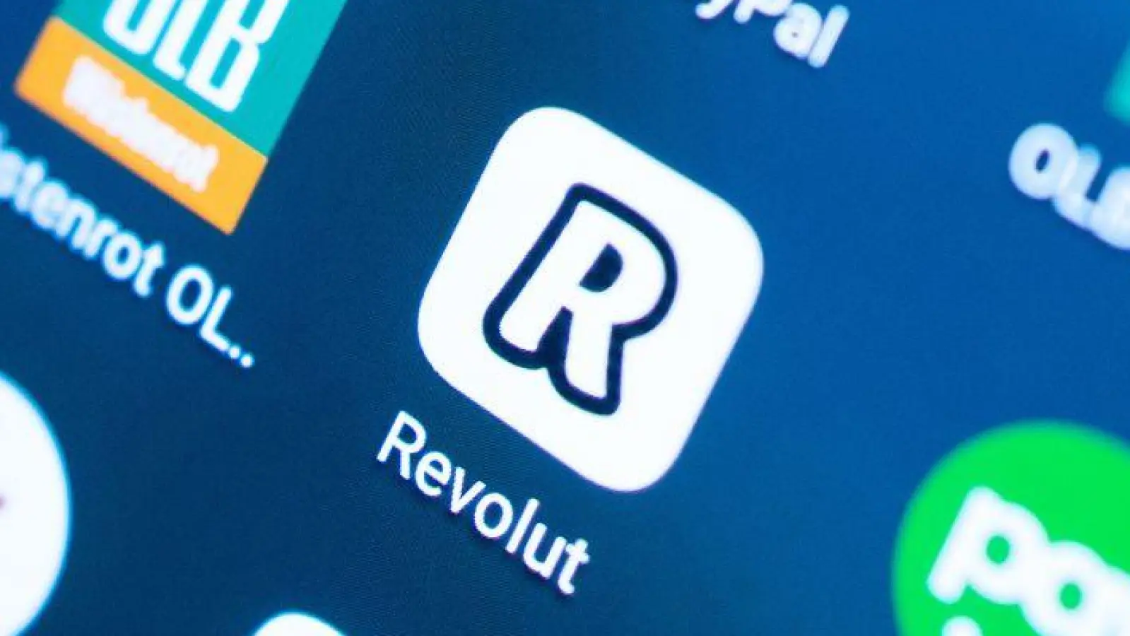 Die britische Digitalbank Revolut expandiert auf den hart umkämpften US-amerikanischen Bankenmarkt. (Symbolbild). (Foto: Monika Skolimowska/dpa-Zentralbild/dpa)