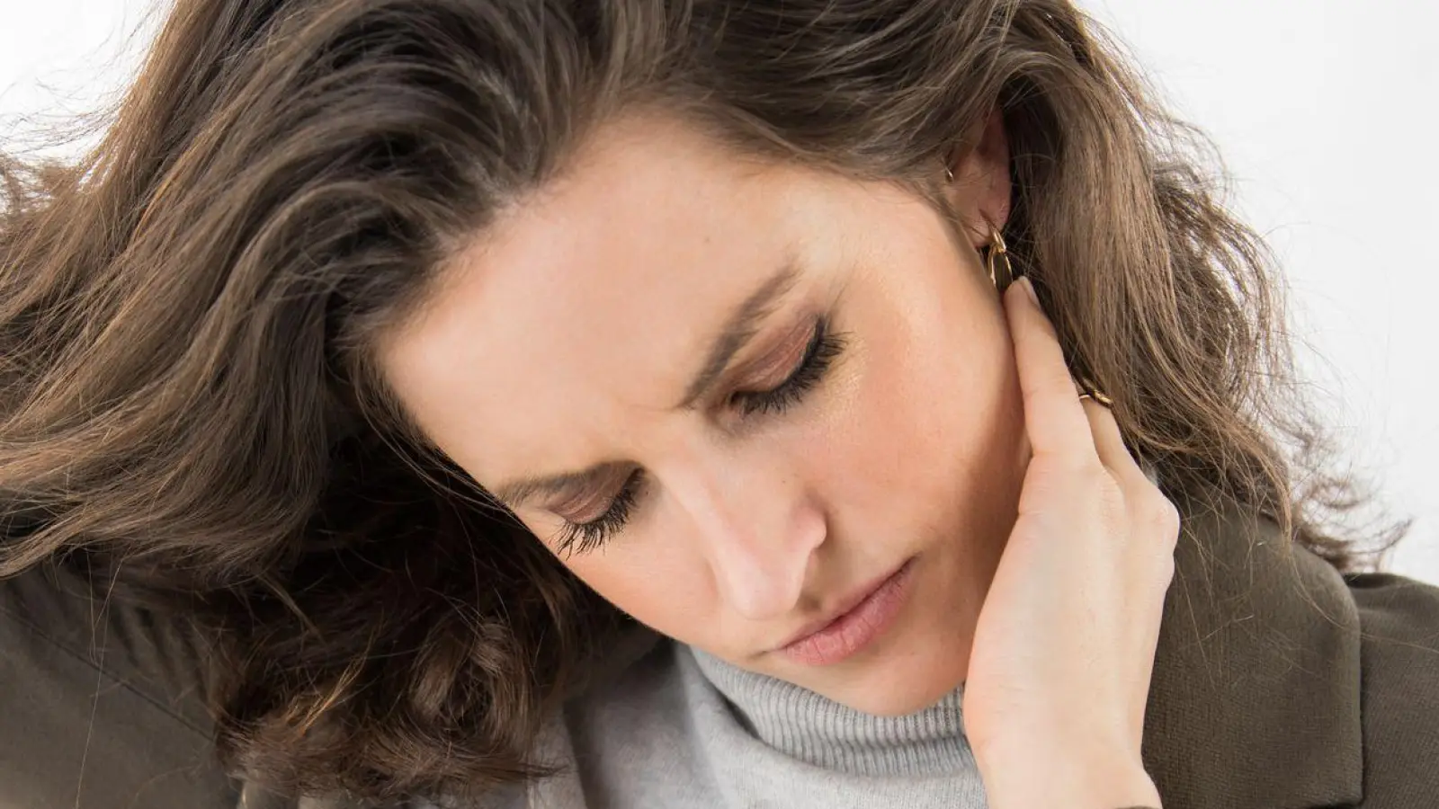 Funktionsstörung im Kausystem: CMD kann Kopf-, Nacken- und Kieferschmerzen verursachen. (Foto: Christin Klose/dpa-tmn)