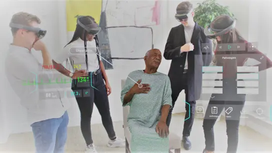 In einer Mixed-Reality-Situation sollen Medizin-Studenten in Zukunft Hologramme als Ersatz für echte Patienten behandeln. (Foto: Gigxr/Cuh/PA Media/dpa)