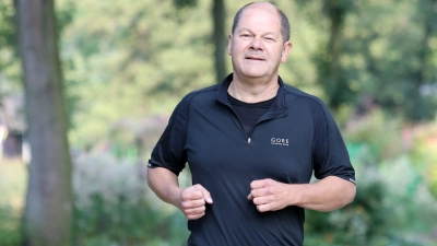 Olaf Scholz joggt gerne. Das geht nicht immer ohne Blessuren ab. (Foto: Bodo Marks/dpa)