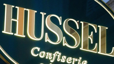 Das Logo der Confiserie „Hussel“. (Foto: Stefan Sauer/dpa-Zentralbild/dpa)
