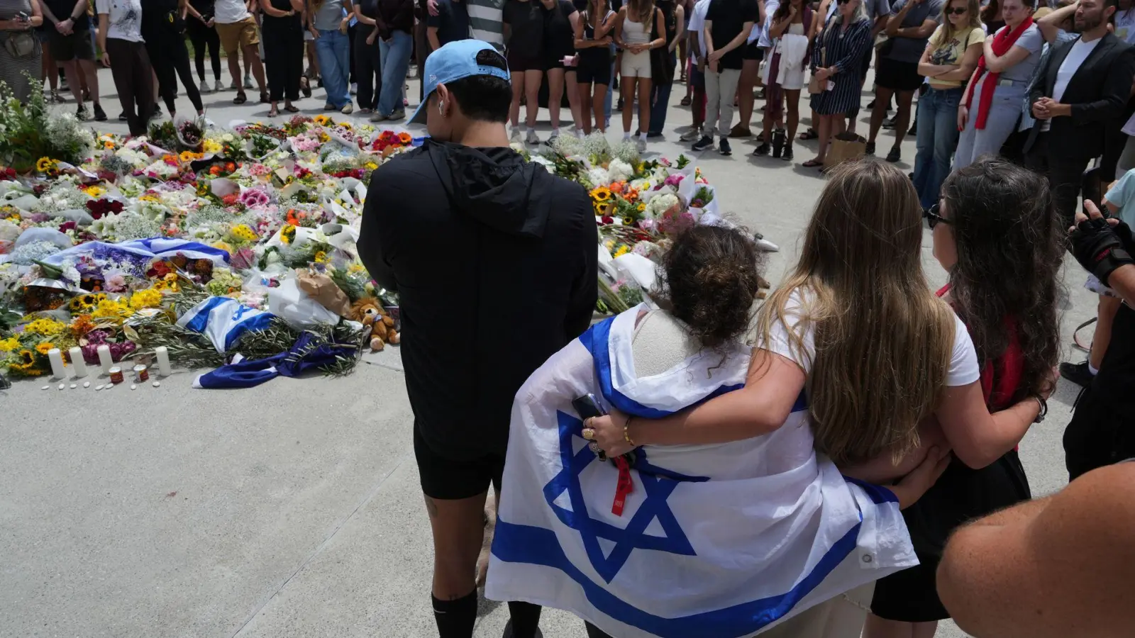 In Australien herrscht am Tag nach dem verheerenden Anschlag tiefer Schock.  (Foto: Mark Baker/AAP/dpa)