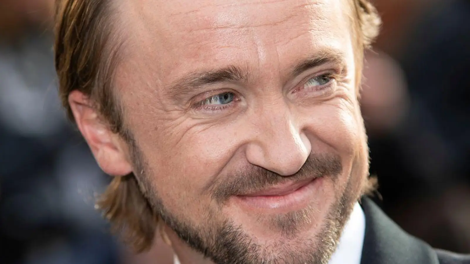 Berühmt wurde er als der blonde Erzrivale Draco Malfoy: Tom Felton kehrt ins Harry-Potter-Universum zurück. (Archivbild) (Foto: Vianney Le Caer/Invision via AP/dpa)