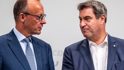 CDU-Chef Friedrich Merz (l) und CSU-Chef Markus Söder plädieren für mehr Rüstungsgüter. (Foto: Michael Kappeler/dpa)