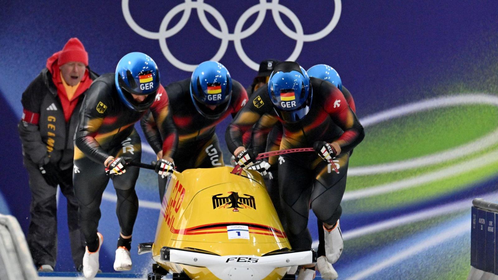 After the first run in the Olympic four-man bobsleigh race: Felix Straub ...