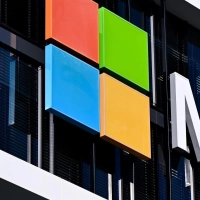 In der Münchner Zentrale von Microsoft ist der Freistaat Bayern ein gerngesehener Kunde. Jahr für Jahr überweist die Staatsregierung viele Millionen für die Nutzung der Produkte in der Verwaltung. (Illustration) (Foto: Sven Hoppe/dpa)