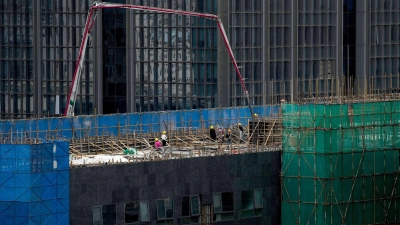 Bau eines Bürogebäudes in Peking. (Foto: Andy Wong/AP)