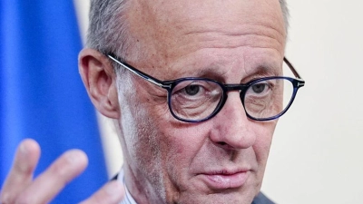 Der Kanzler zeigte sich heute erstmal erleichtert. (Foto: Kay Nietfeld/dpa)