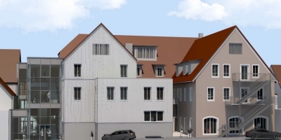 So war es gedacht: Weil der Stadt Merkendorf das Brauereiprojekt finanziell über den Kopf gewachsen ist, muss abgespeckt werden. Nach Stand der Dinge wird nun der graue Gebäudeteil in der Mitte komplett wegfallen. Es handelt sich um die Ansicht von der Brauhausstraße. (Visualisierung: Architekturbüro Hochreiter + Lechner)